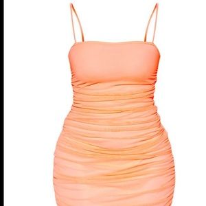 Peach ruched midi dress